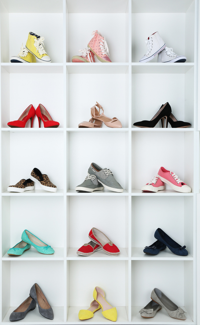 Collection of Shoes on Shelves